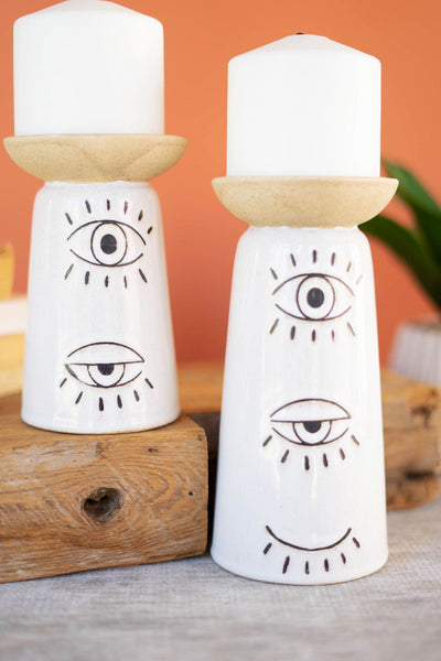 Set of 2 Ceramic Candle Holders with Eyes Detail